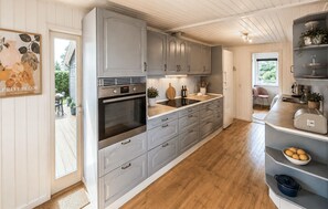 Coffee/tea maker, fridge, stovetop, dishwasher