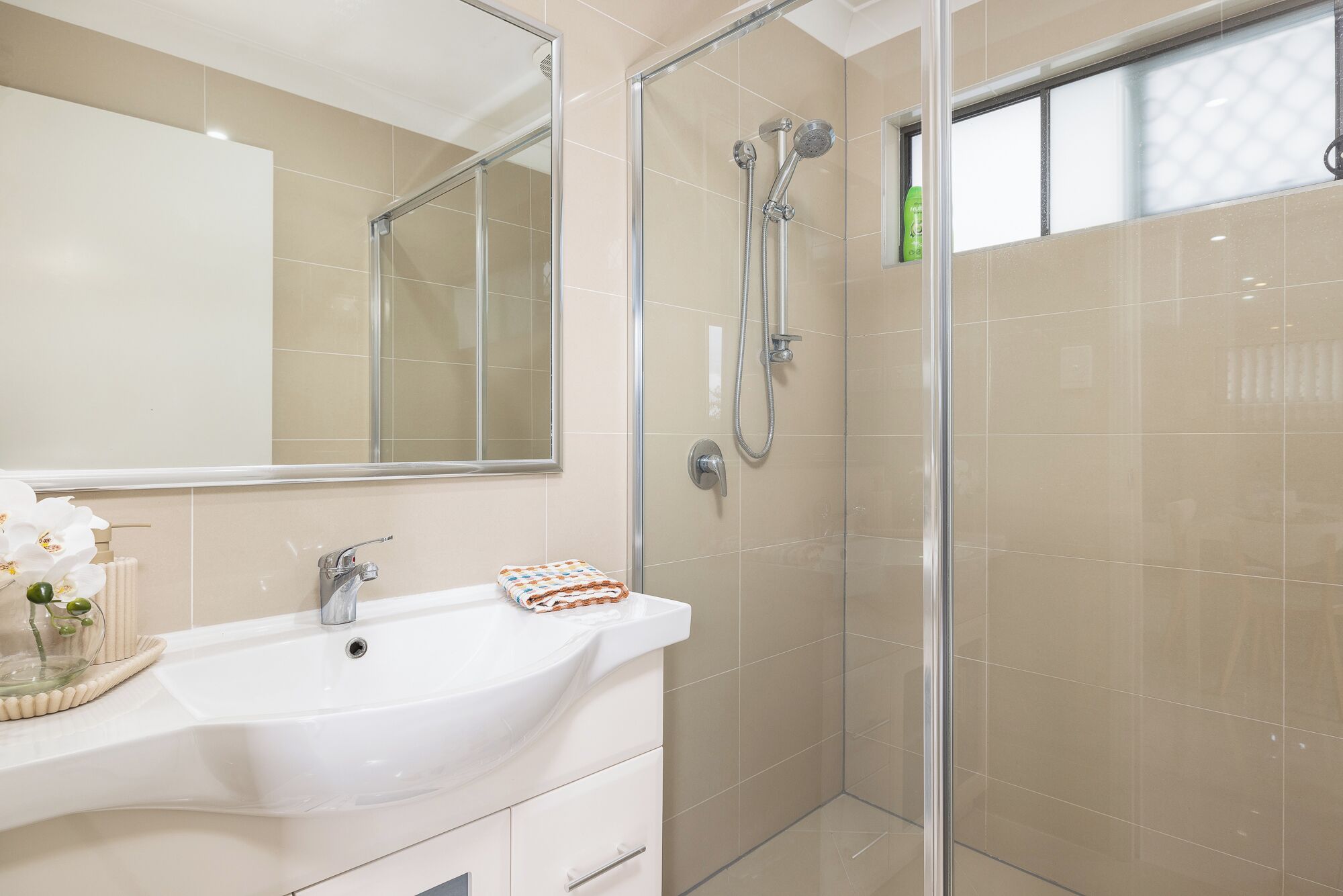 Shower, hair dryer, soap, shampoo