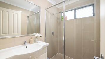Shower, hair dryer, soap, shampoo