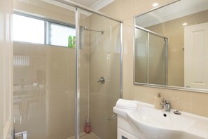 Shower, hair dryer, soap, shampoo