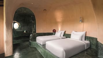 Cubrecamas, colchones con pillow-top y artículos del minibar gratis