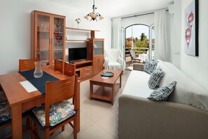 TV - Apartment 'M - 1' with Shared Pool, Private Terrace and Wi-Fi (Torrox costa)