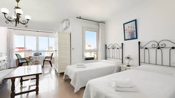 1 habitación, tabla de planchar con plancha, wifi gratis y ropa de cama