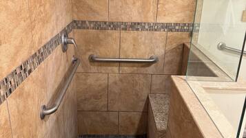 Shower, hair dryer, towels, toilet paper