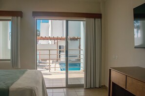 Deluxe Double Room, 2 Double Beds, Pool View, Ground Floor | Down comforters, individually decorated, individually furnished, desk - Costa Elegante Hotel & Suites (Puerto Peñasco)
