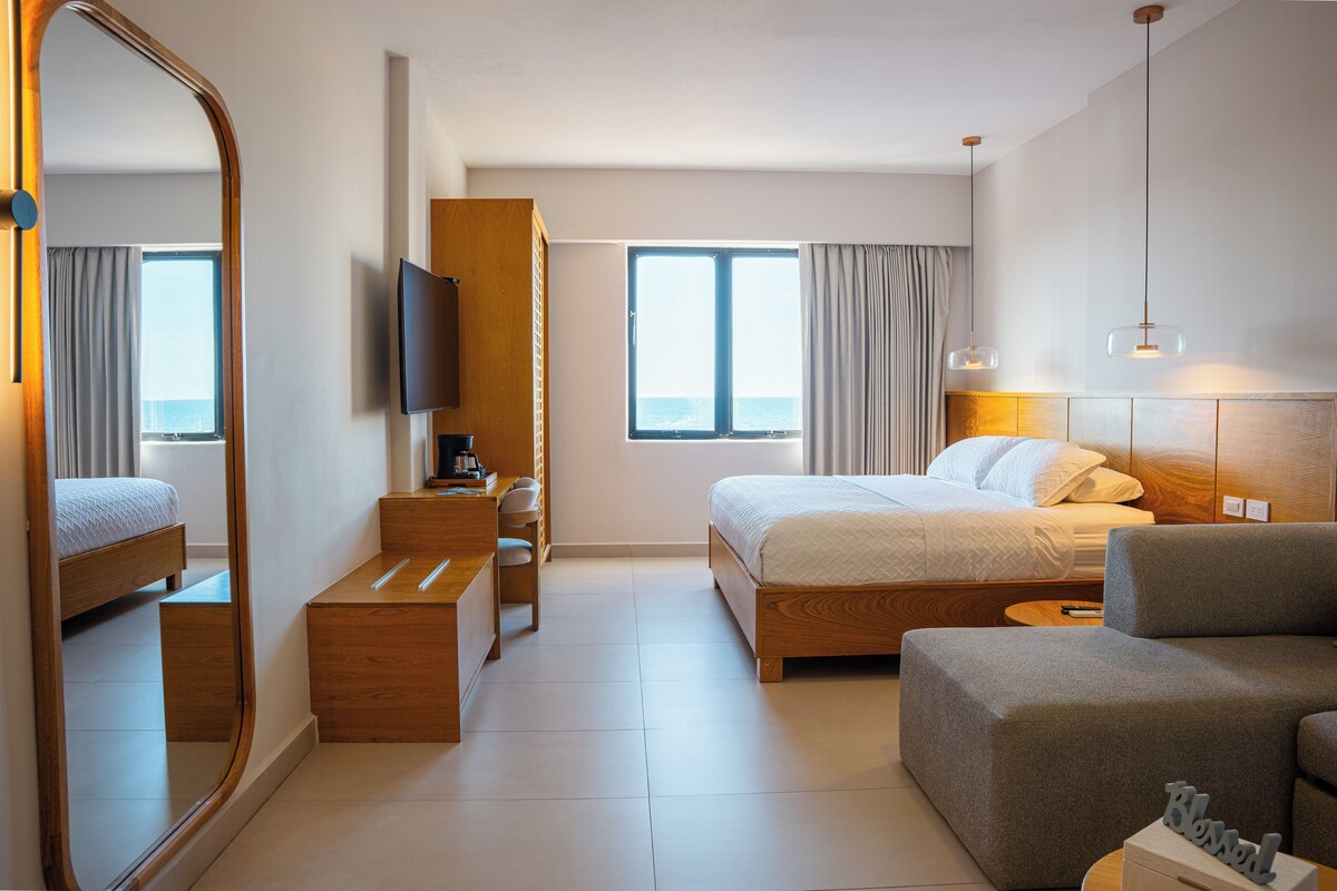 Superior Studio Suite, 1 King Bed with Sofa bed, Ocean View | Down duvets, desk, laptop workspace, iron/ironing board (on request)