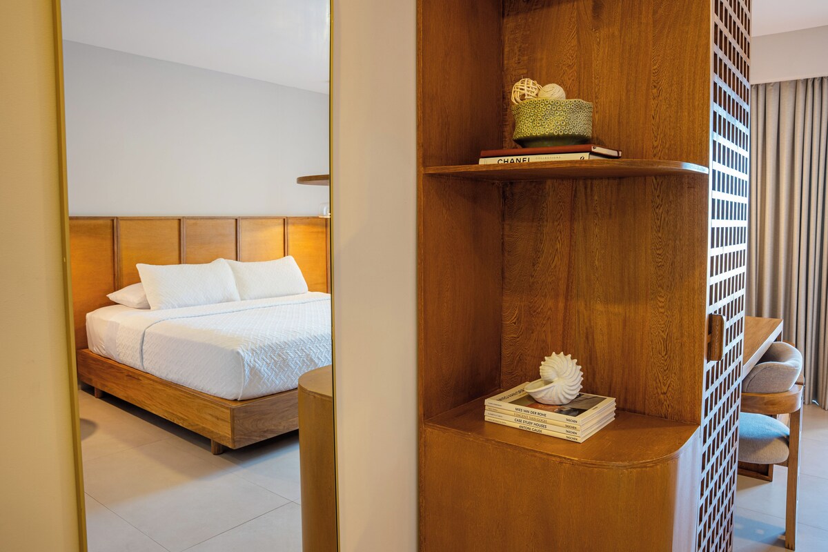 Deluxe Room, 1 King Bed, Pool View, Ground Floor | Down duvets, desk, laptop workspace, iron/ironing board (on request)