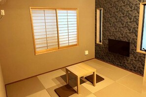 Apartamento | Wi-Fi de cortesia, roupa de cama