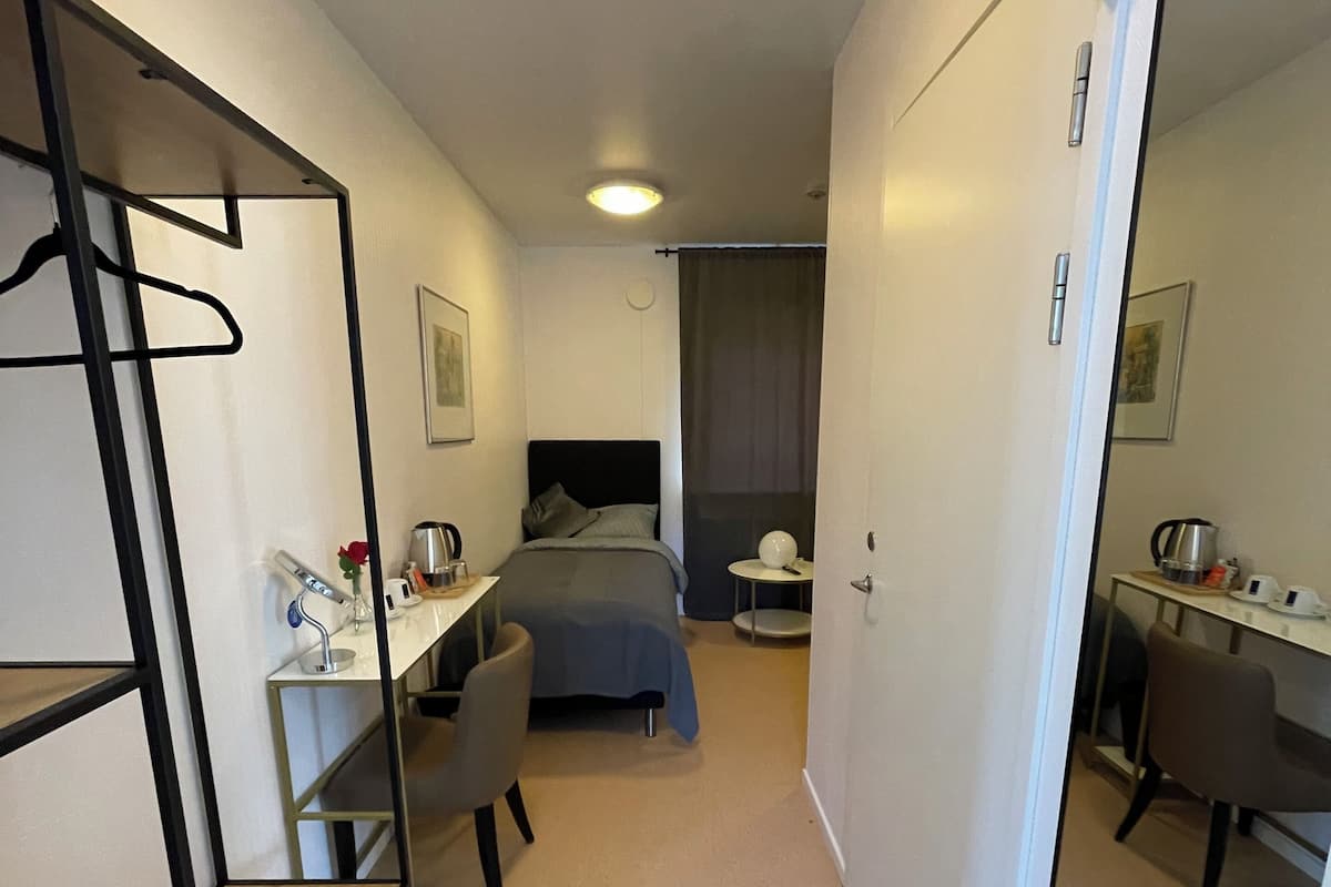 Habitación Confort con 1 cama matrimonial o 2 individuales, vista al jardín | Escritorio, espacio para trabajar con laptop y wifi gratis