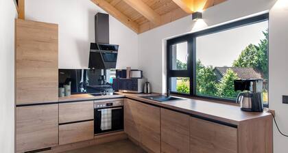 Apartment 'Ferienoase Im Land Der 1000 Seen' with Private Terrace, Shared Garden and Wi-Fi