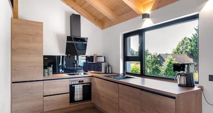 Ferienwohnung 'Ferienoase Im Land Der 1000 Seen' mit Privatterrasse, Gemeinschaftsgarten und WLAN