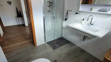 Shower, free toiletries, hair dryer, towels