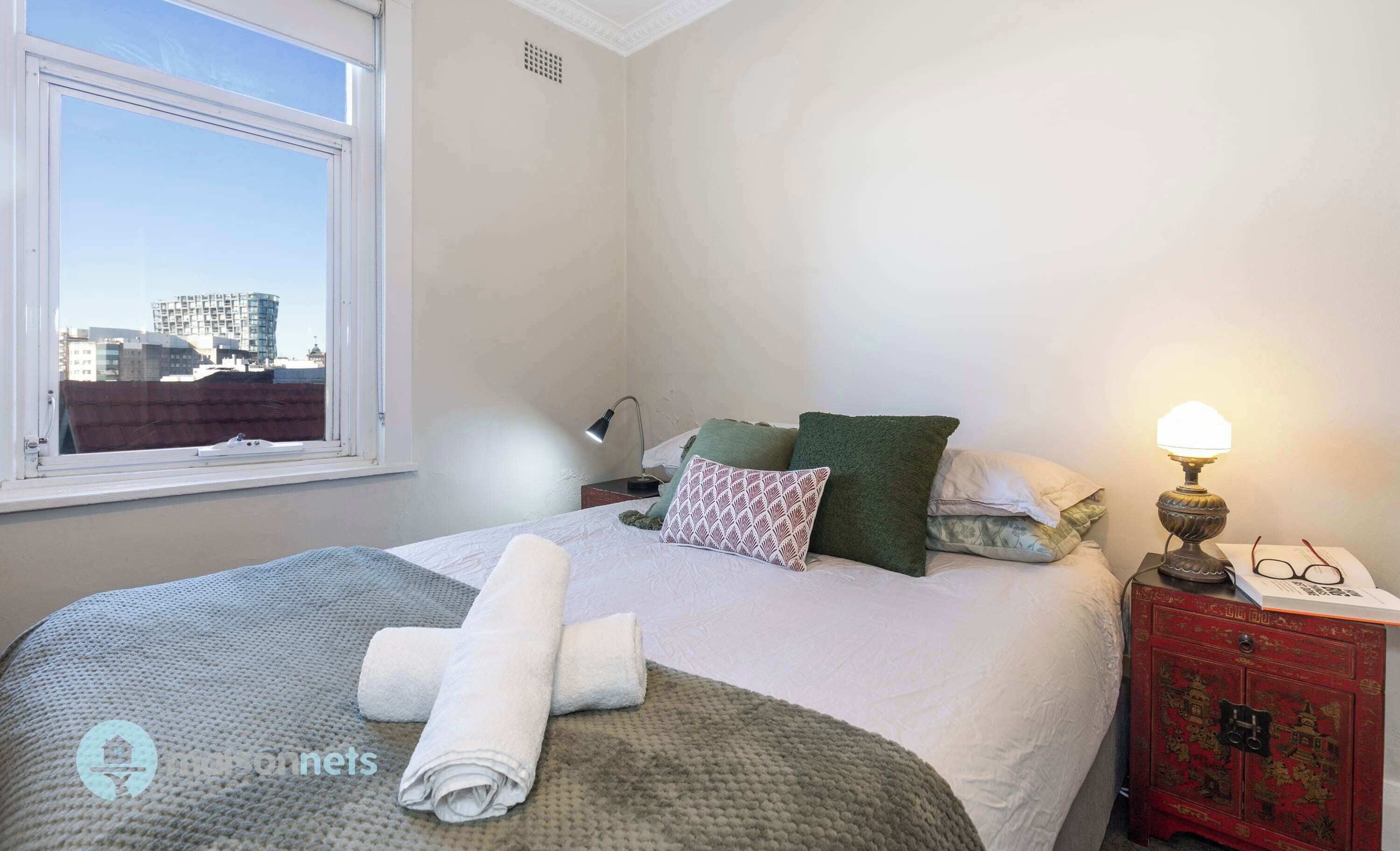 Master bedroom has queen bed and block out blinds
