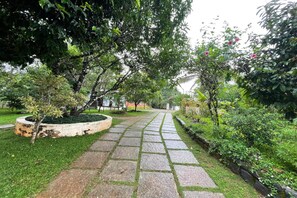 Premium Room | Garden view - AyurGem Ayurveda Yoga &  Wellness Retreat (Devikolam)