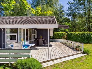 Enjoy a relaxing stay in this two-story residence with a balcony and pool view.