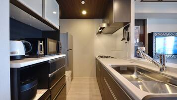 Apartment | Private kitchen | Fridge, microwave, stovetop, electric kettle