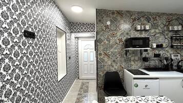 Apartment | Private kitchen | Fridge, microwave, cookware/dishes/utensils
