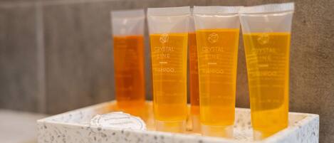 Shower, hair dryer, soap, shampoo