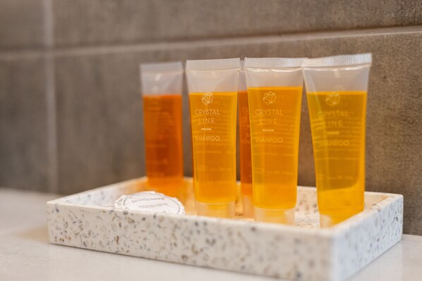 Shower, hair dryer, soap, shampoo