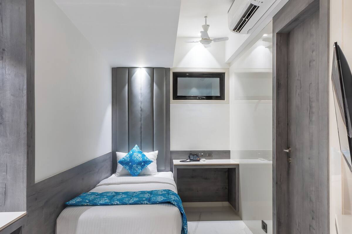 Deluxe Single - Newly Constructed | Escritorio, wifi gratis, ropa de cama