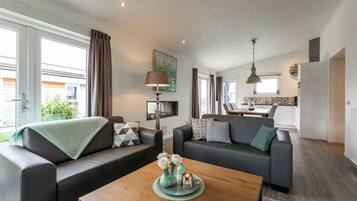 Deluxe Bungalow, Non Smoking, Patio (Schaelsbergerbosch - Fireplace) | Living area | TV