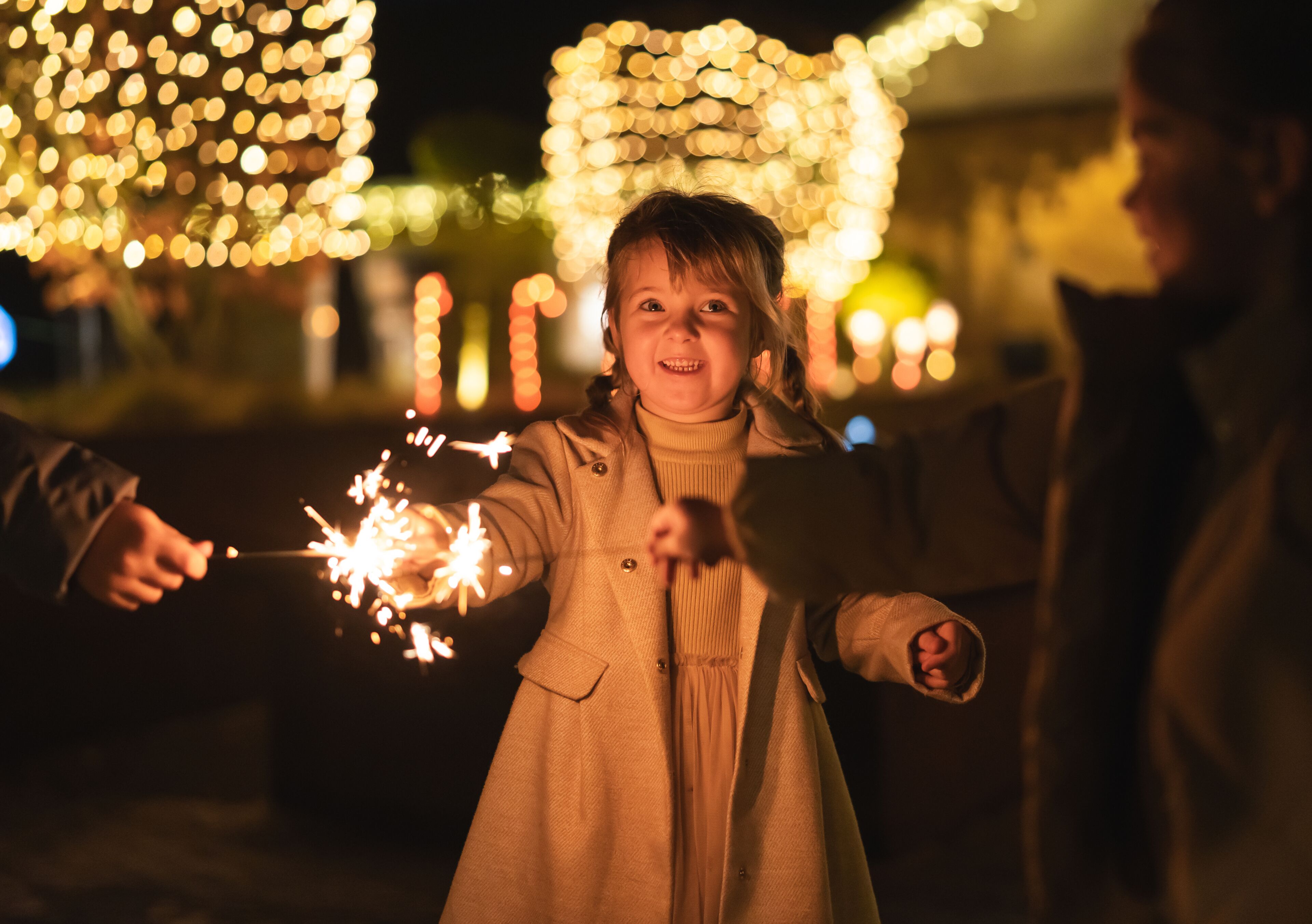 A person holding a sparkler.