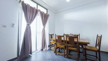 Classic Apartment, Balcony | Living area | TV