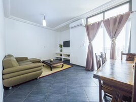 Classic Apartment, Balcony | Living area | TV
