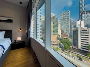 Business Apartment, City View | Room amenity
