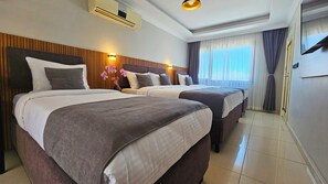 Terrace Room | Ropa de cama de alta calidad, minibar, escritorio y insonorización 
