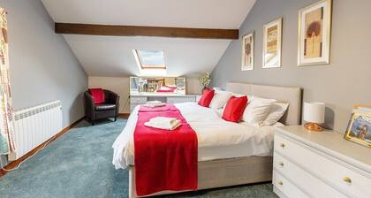 Spacious Apartment with Rolling Hill Views