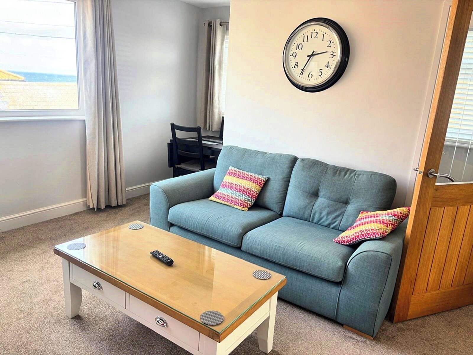 Family Apartment | Living area | 20-inch flat-screen TV with digital channels