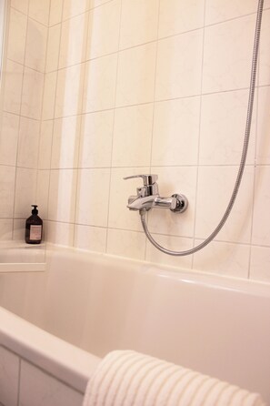 Hair dryer, towels, soap, toilet paper