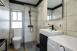 Shower, hair dryer, towels, soap