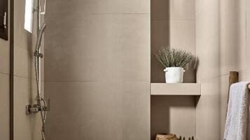 Shower, eco-friendly toiletries, hair dryer, towels