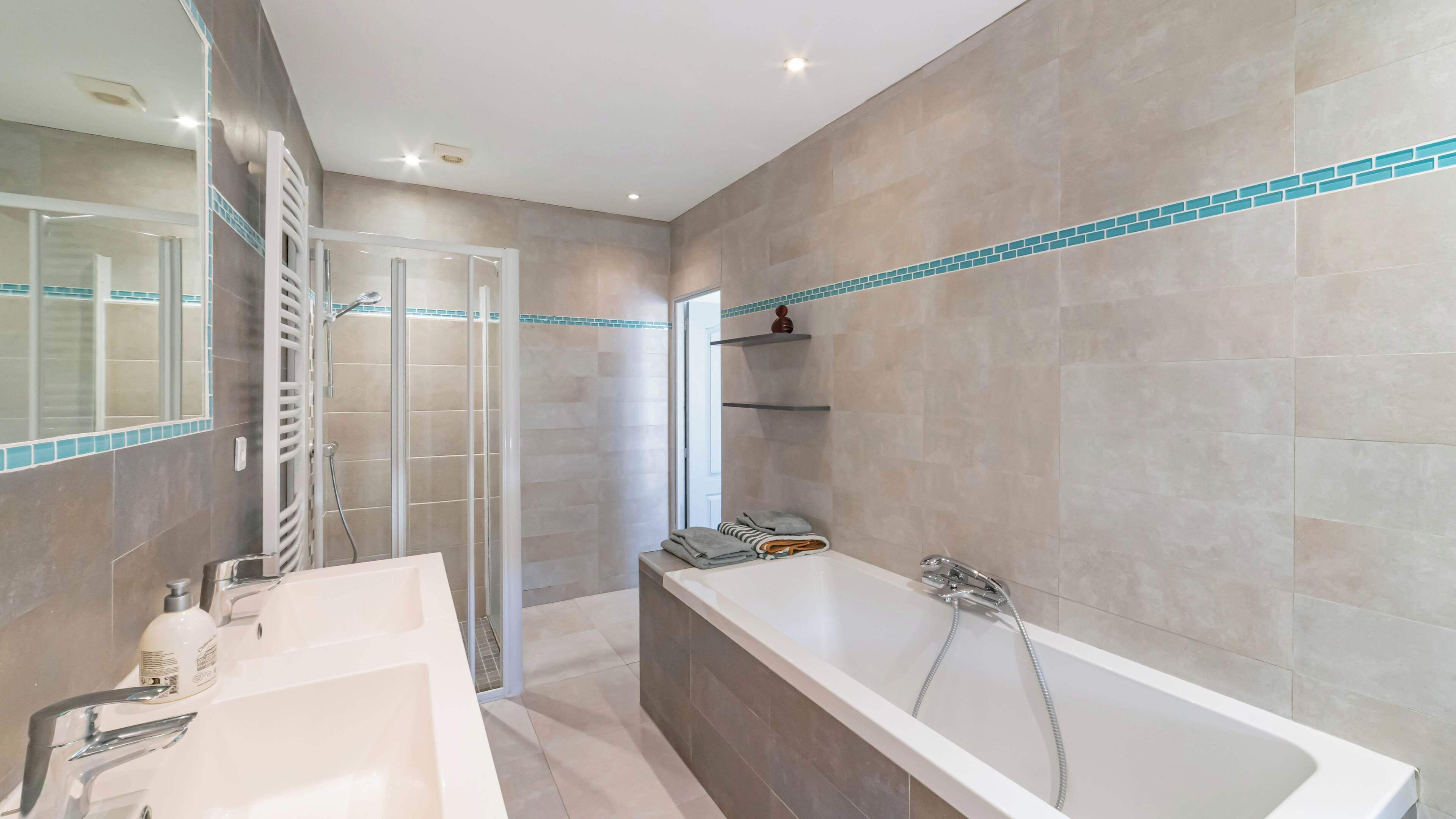 Shower, hair dryer, towels, soap