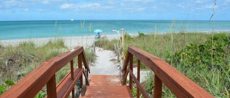 On the beach, sun loungers, beach towels