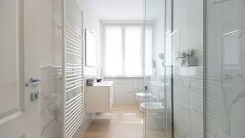 Shower, bidet, towels, soap