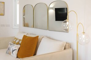 Apartamento luxo, vista para a cidade | Área de estar