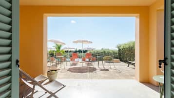Family Room, Pool View | Terrace/patio