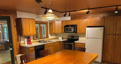 Large family mountain retreat on Buck Run with a stocked pond in Leetonia Pa.