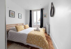 1 bedroom, desk, iron/ironing board, travel cot