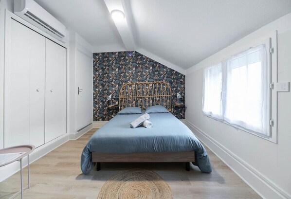 1 bedroom, desk, iron/ironing board, travel crib