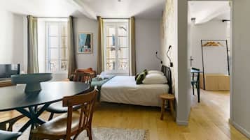 Iron/ironing board, travel crib, free WiFi, bed sheets