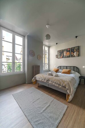 1 bedroom, desk, iron/ironing board, travel crib