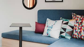 Studio, 1 King Bed | Living area | 60-inch LCD TV with satellite channels