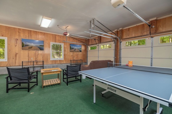 Game room for the kids (and adults) with TV's Ping Pong and indoor basketball