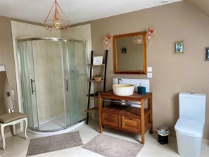 Shower, hair dryer, towels, soap