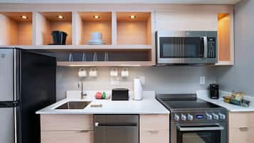Suite, 1 Bedroom | Private kitchen | Full-size fridge, microwave, dishwasher, coffee/tea maker
