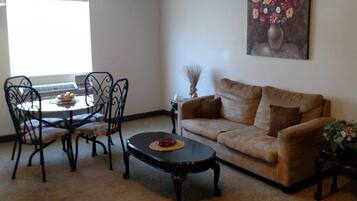 Family Apartment | Living area | 32-inch LED TV with satellite channels